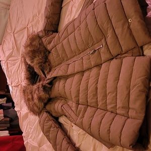 Womens size large leather coat in pink/beige,  the maker is Bellivera